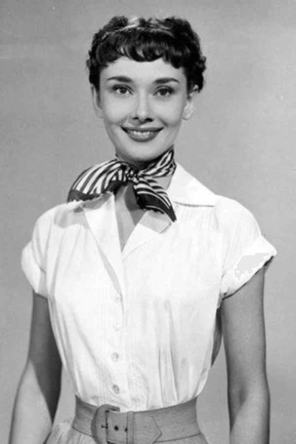 The Silk Scarf: Why This Accessory Belongs in Every Wardrobe 4 Audrey Hepburn in the movie “Roman Holiday”